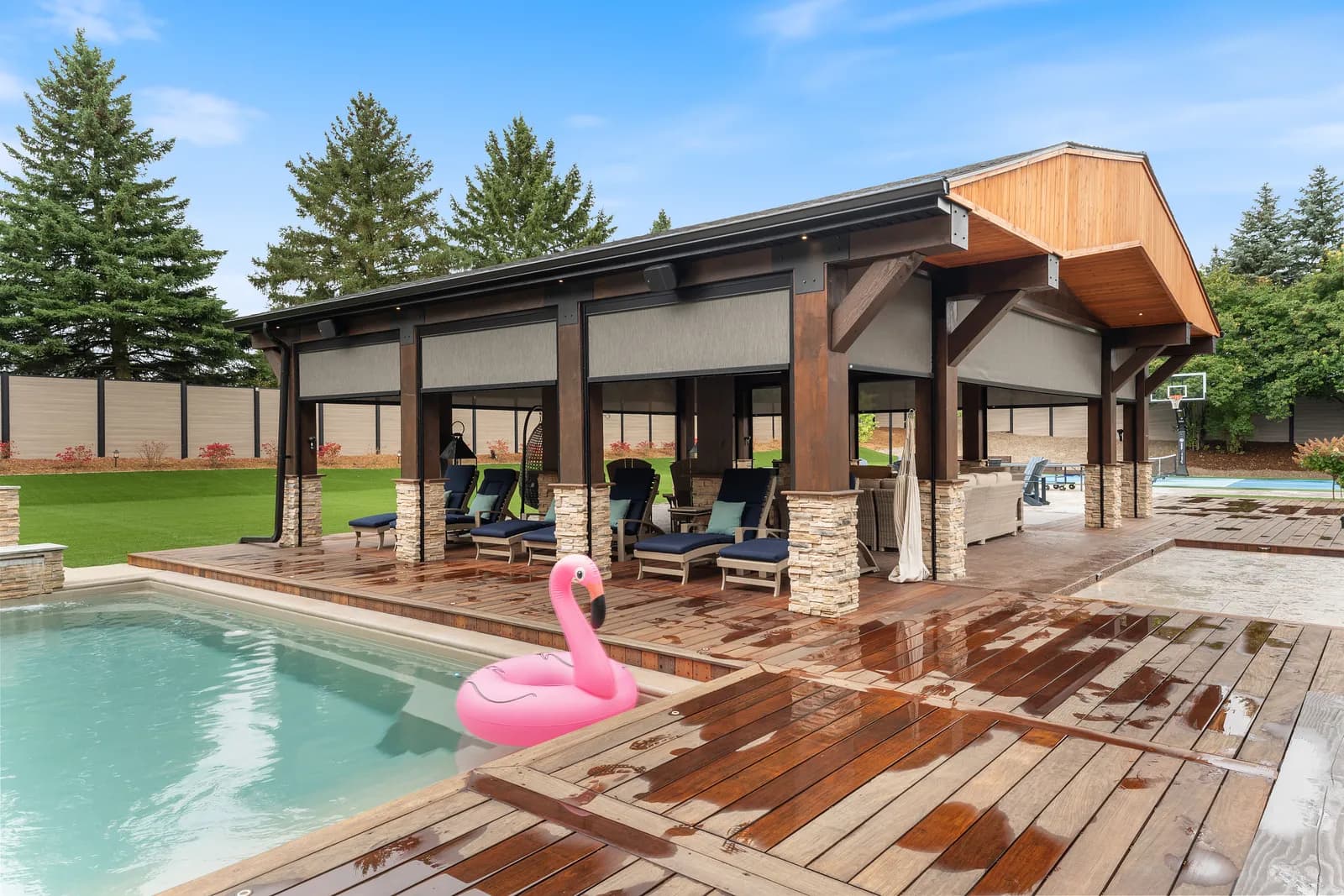 Pool-side cabana with multiple Talius solar shades deployed