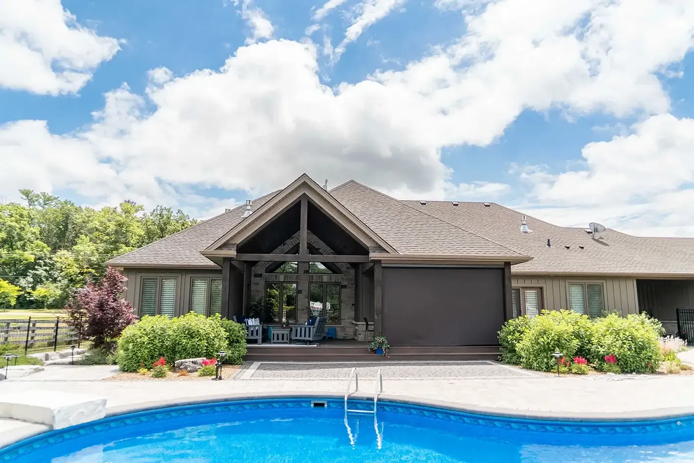 Timber-frame Ontario home with pool and retractable screens