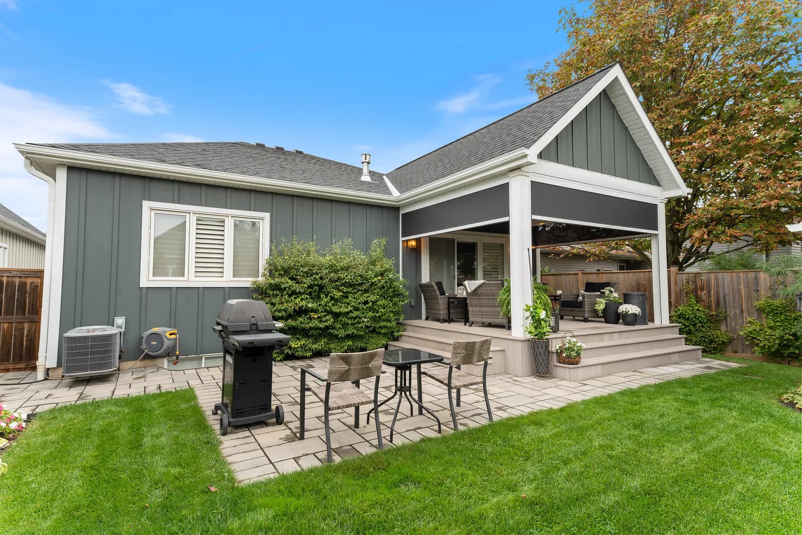 Suburban home with retractable screens hidden in the soffit